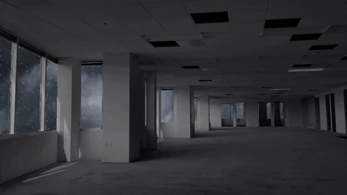 Endless office backroom with yellow lighting